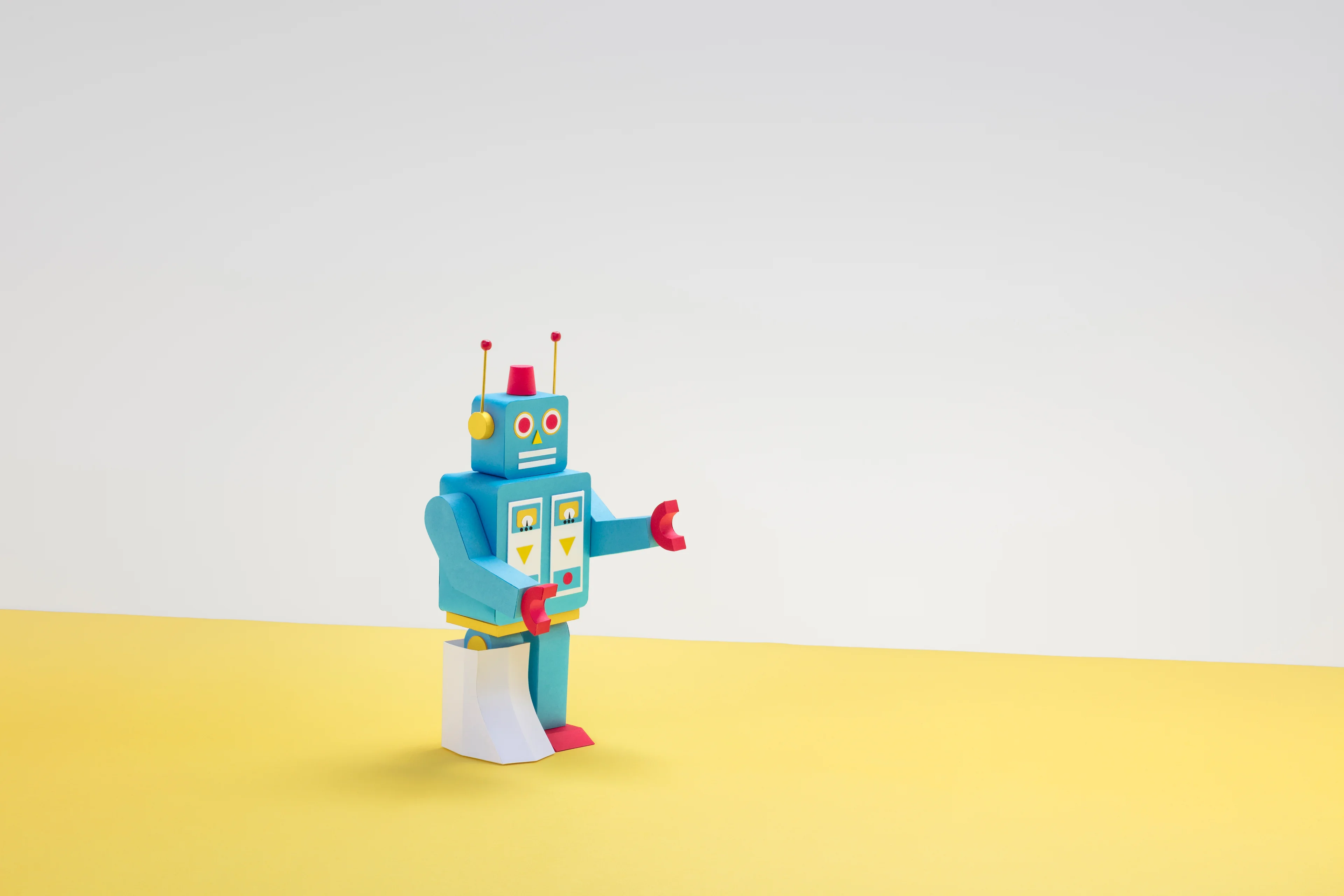 Shop & Ship paper-craft robot representing Shop & Ship Protect service
