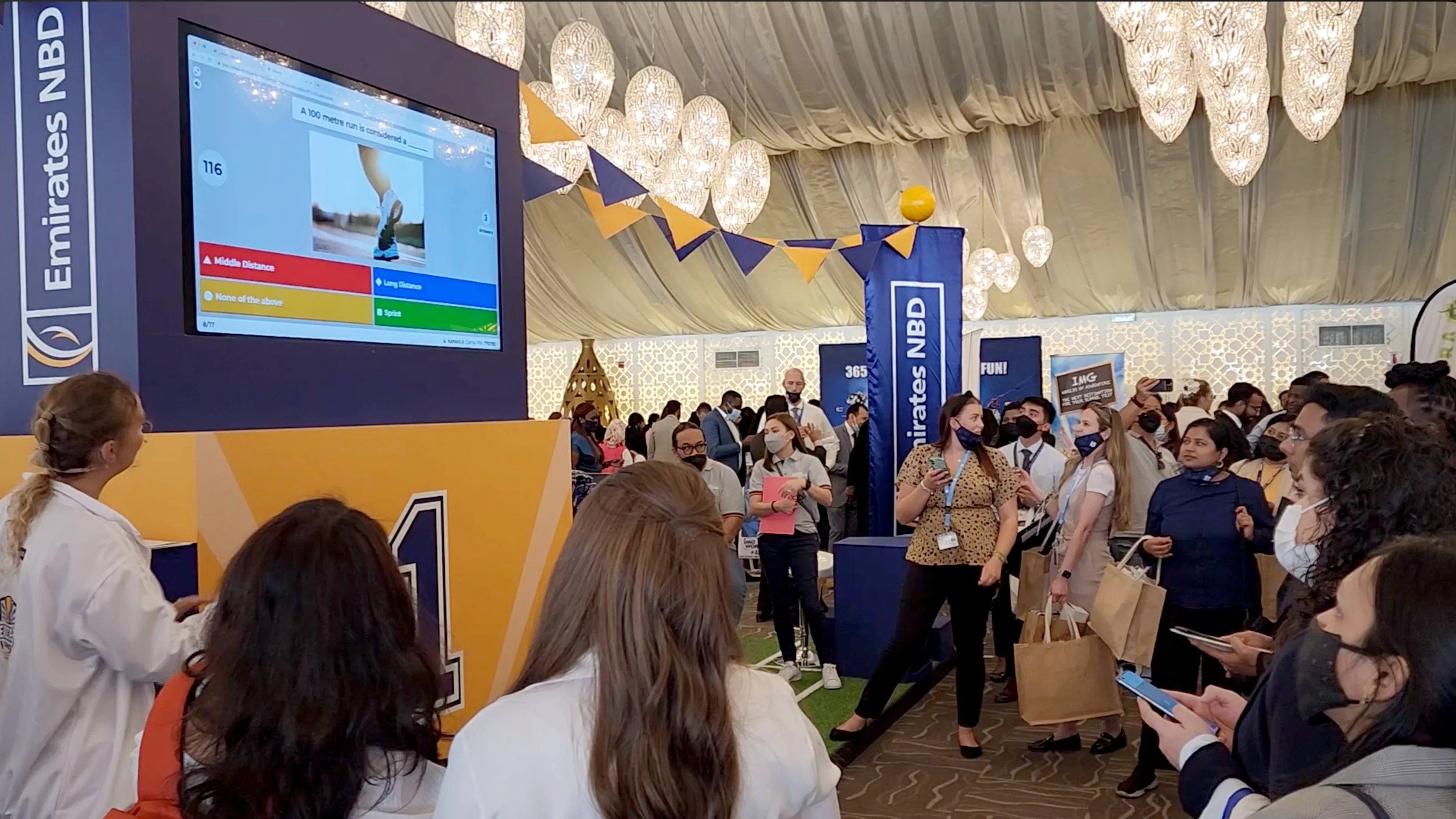 Teachers taking part in Teacher Tourney, a sports day-inspired Emirates NBD activation designed by Almost Impossible.